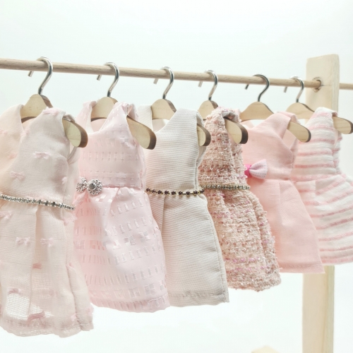 Miniature sartoriali in tessuti pregiati total pink